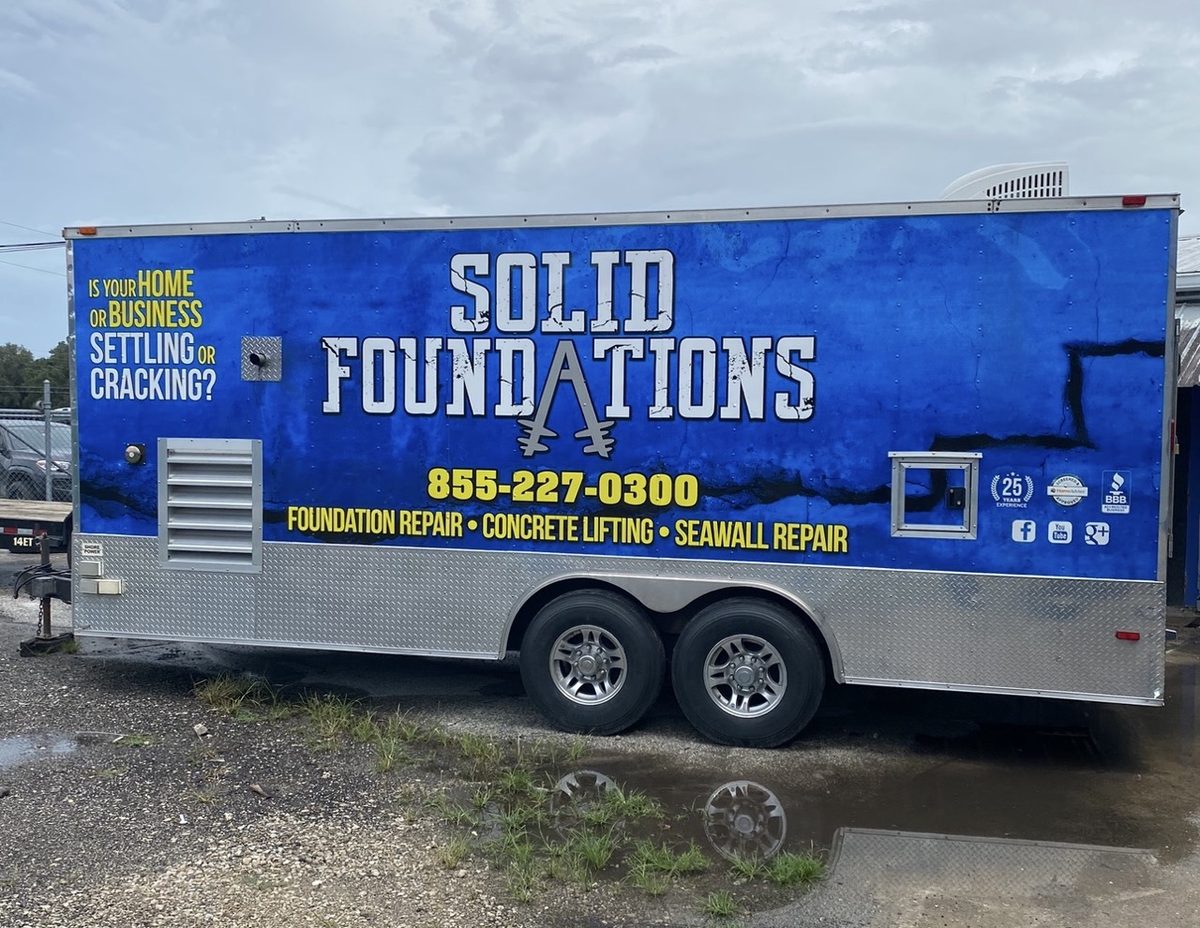 Foundation repair equipment staged at a job site