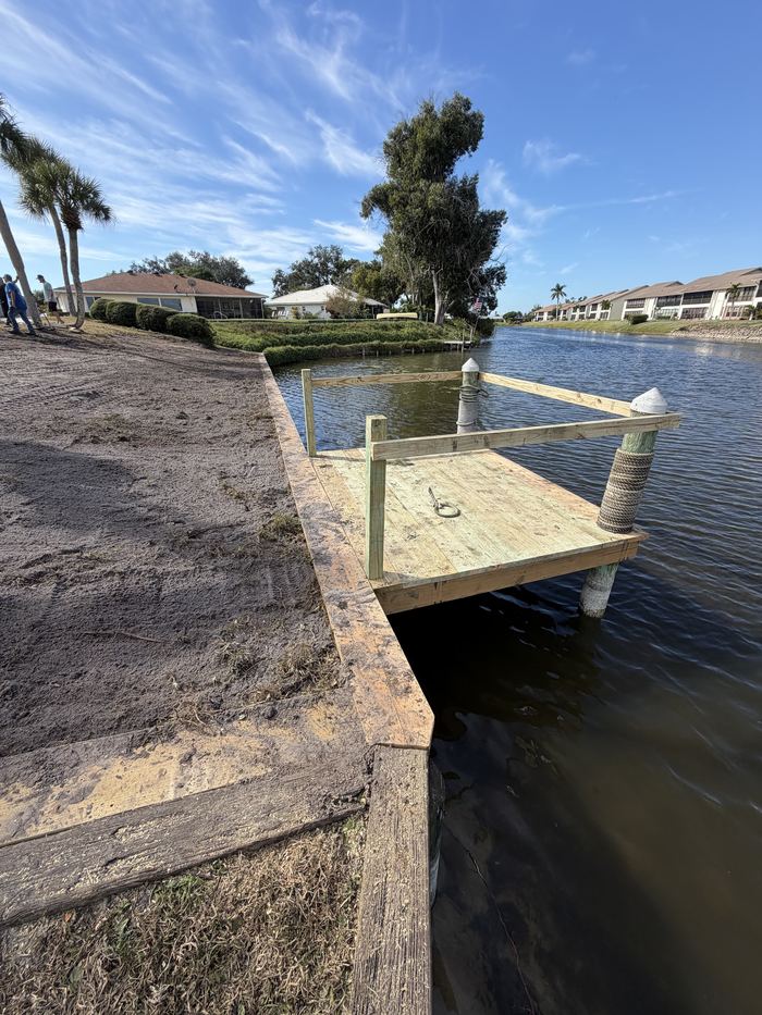 Newly built dock and seawall corner on a Florida canal