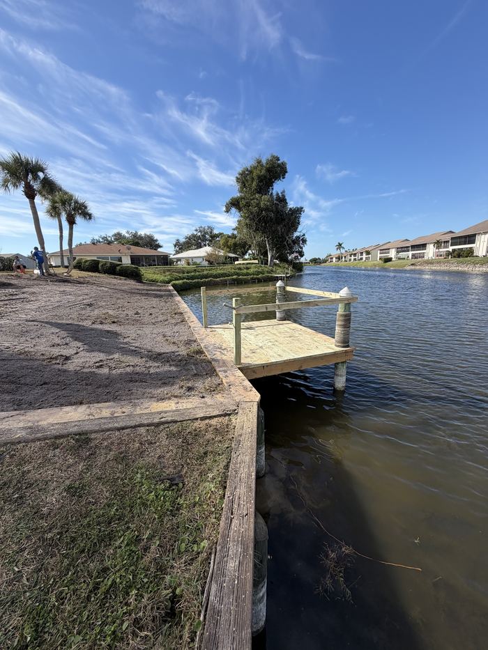 Finished dock and seawall along a Florida canal