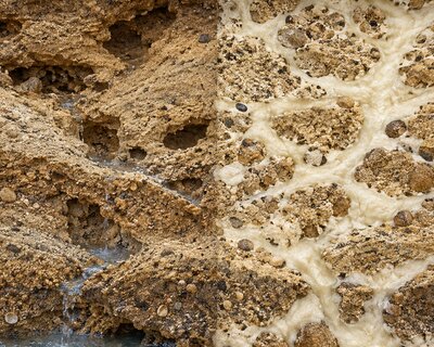 Side-by-side comparison of eroded soil voids beneath a slab and the same voids filled solid with polyurethane foam