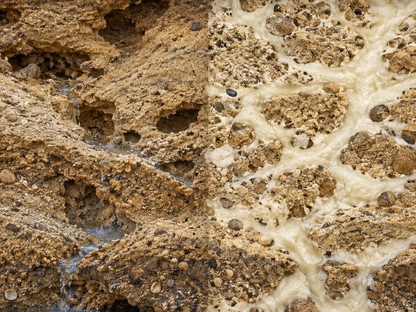 Before-and-after cutaway comparing eroded, water-damaged soil to soil stabilized and bound together with polyurethane foam